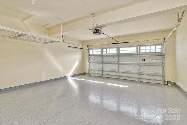7079 Waterwheel St SW, Concord, NC 28025 - garage with a garage door opener and baseboards