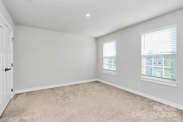 7079 Waterwheel St SW, Concord, NC 28025 - spare room with carpet