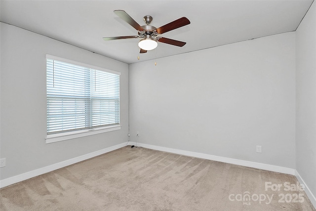 7079 Waterwheel St SW, Concord, NC 28025 - empty room featuring light carpet and a ceiling fan