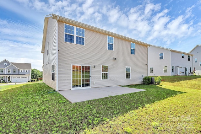 7079 Waterwheel St SW, Concord, NC 28025 - back of house featuring a patio area and a lawn