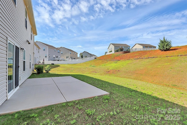 7079 Waterwheel St SW, Concord, NC 28025 - view of grassy yard featuring a patio and a residential view