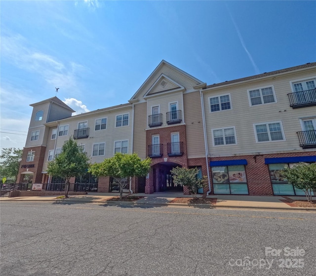 1410 4th Street Dr NW Unit 303, Hickory, NC 28601 - view of front of home featuring brick siding