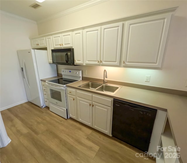 1410 4th Street Dr NW Unit 303, Hickory, NC 28601 - kitchen featuring black appliances, crown molding, white cabinets, light wood-type flooring, and light countertops