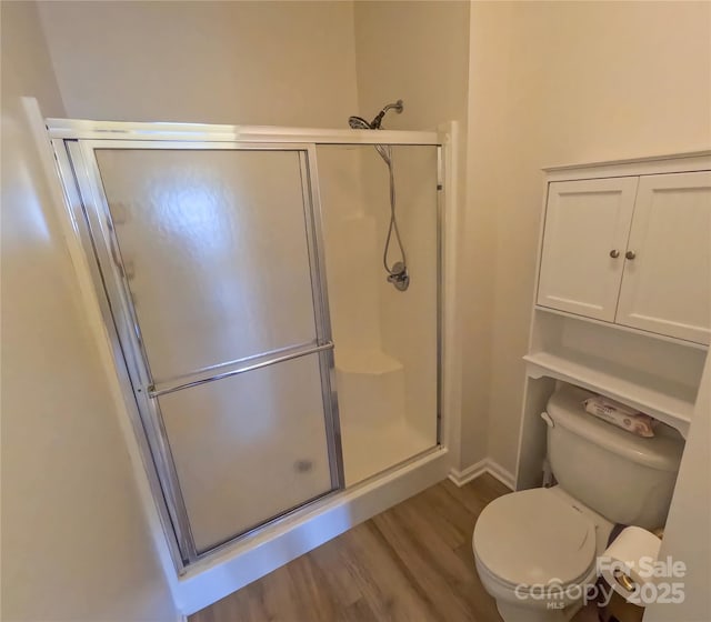 1410 4th Street Dr NW Unit 303, Hickory, NC 28601 - full bathroom with wood finished floors and a shower stall