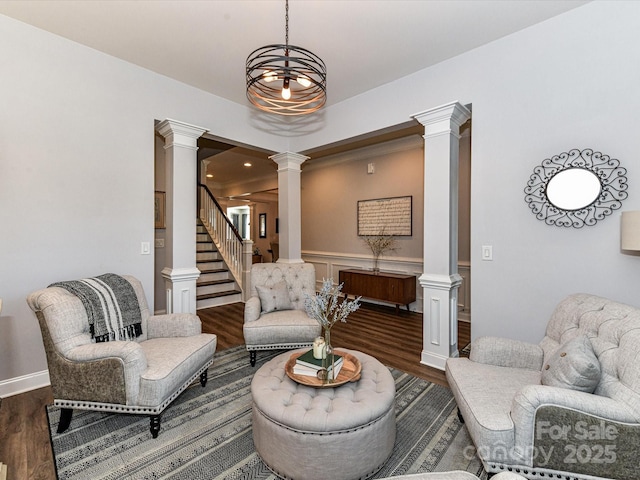 2005 Arbor Hills Dr, Indian Trail, NC 28079 - living area featuring decorative columns, dark wood-style flooring, and stairway
