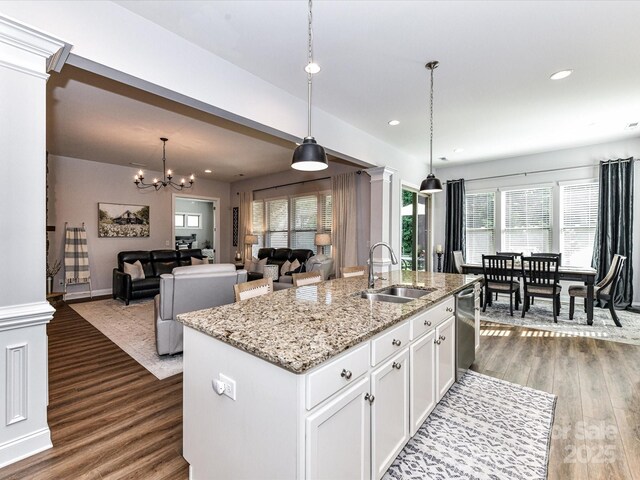 2005 Arbor Hills Dr, Indian Trail, NC 28079 - kitchen featuring stainless steel dishwasher, dark wood-style flooring, an island with sink, a chandelier, and recessed lighting