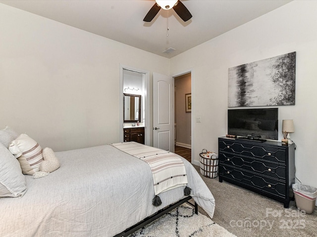 2005 Arbor Hills Dr, Indian Trail, NC 28079 - carpeted bedroom with ensuite bath and a ceiling fan