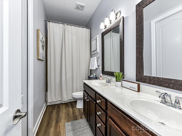 2005 Arbor Hills Dr, Indian Trail, NC 28079 - full bathroom with double vanity, wood finished floors, and curtained shower