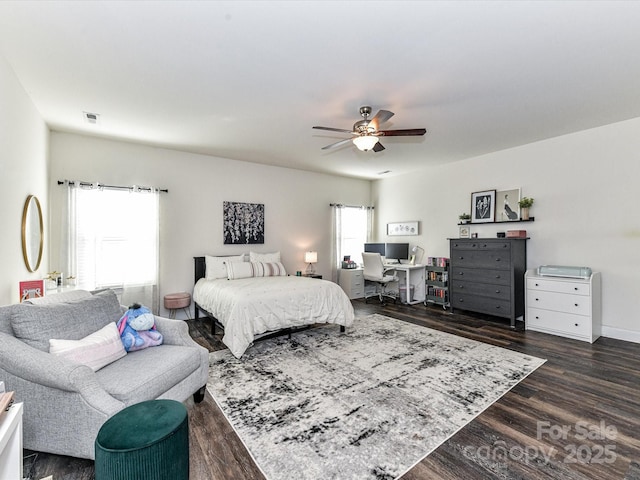 2005 Arbor Hills Dr, Indian Trail, NC 28079 - bedroom with dark wood finished floors, ceiling fan, and an office area