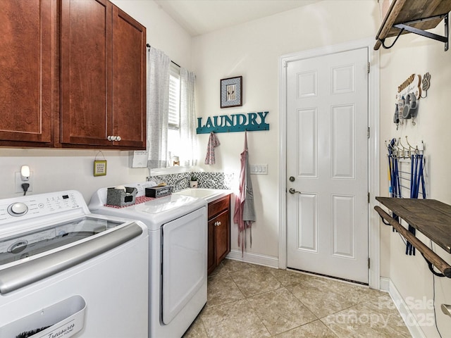 2005 Arbor Hills Dr, Indian Trail, NC 28079 - laundry area with cabinet space, washing machine and clothes dryer, and light tile patterned floors