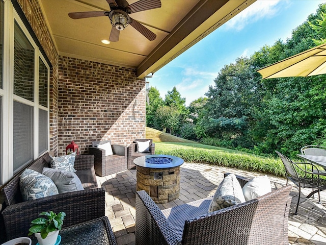 2005 Arbor Hills Dr, Indian Trail, NC 28079 - view of patio with an outdoor living space with a fire pit, a ceiling fan, and view of wooded area