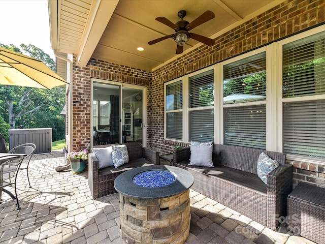2005 Arbor Hills Dr, Indian Trail, NC 28079 - view of patio / terrace with a ceiling fan and an outdoor living space with a fire pit