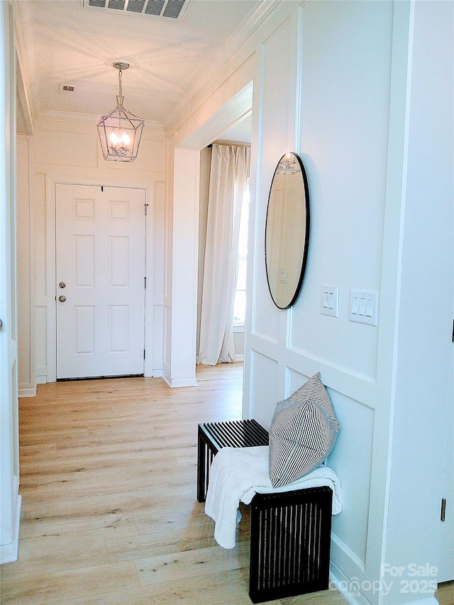 1141 Overlake Dr, Belmont, NC 28012 - foyer featuring ornamental molding and light wood finished floors
