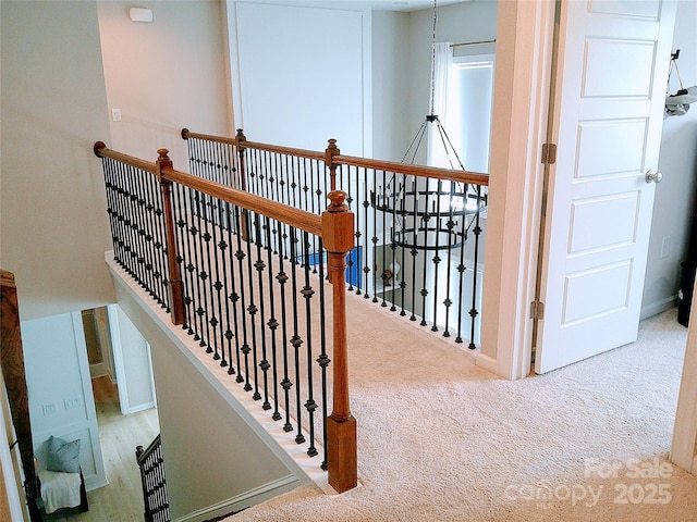 1141 Overlake Dr, Belmont, NC 28012 - hall featuring carpet flooring and an upstairs landing