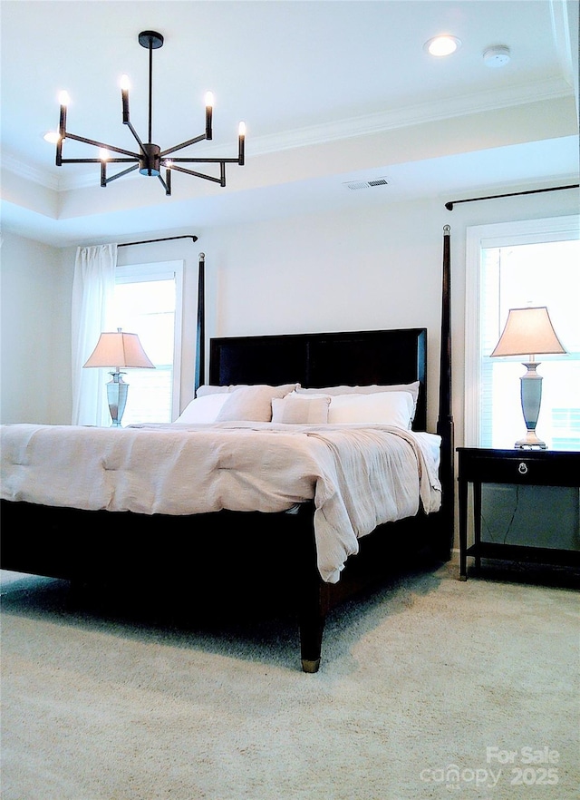 1141 Overlake Dr, Belmont, NC 28012 - carpeted bedroom featuring crown molding, a chandelier, a tray ceiling, and recessed lighting