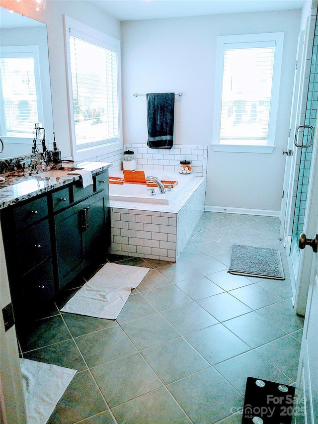 1141 Overlake Dr, Belmont, NC 28012 - full bath featuring vanity, healthy amount of natural light, a bath, and tile patterned floors