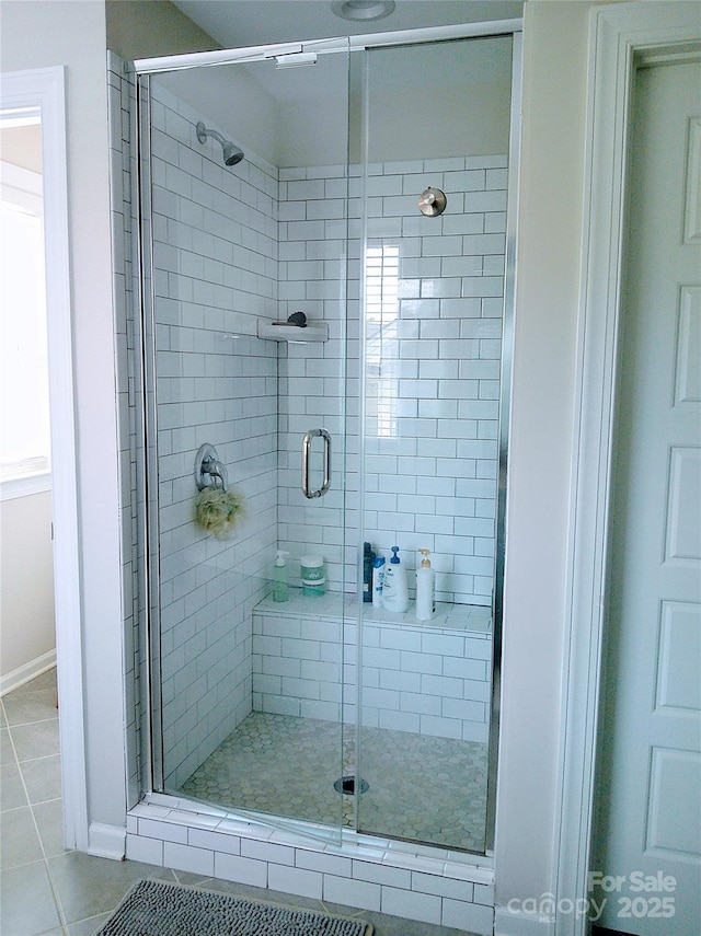 1141 Overlake Dr, Belmont, NC 28012 - bathroom with tile patterned flooring and a shower stall