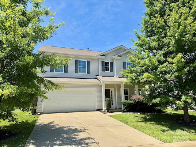 11109 Pond Valley Ct, Charlotte, NC 28269 - traditional home with driveway, an attached garage, a front yard, and covered porch