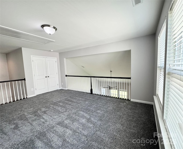 11109 Pond Valley Ct, Charlotte, NC 28269 - unfurnished room with attic access and carpet floors