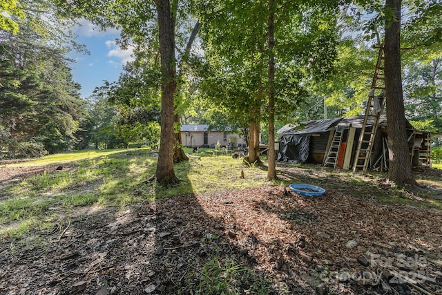 8301 Pine Oak Rd, Waxhaw, NC 28173 - view of yard with an outbuilding