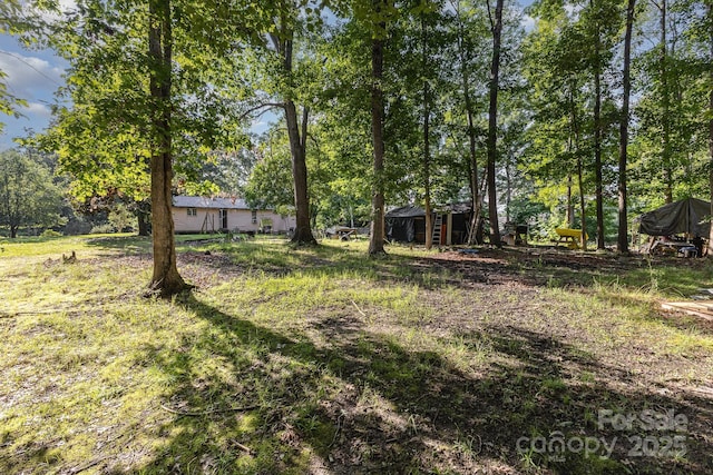8301 Pine Oak Rd, Waxhaw, NC 28173 - view of yard with view of wooded area