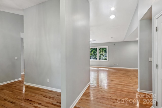 104 Britton Ave, Hendersonville, NC 28791 - corridor featuring light wood-style flooring, vaulted ceiling, and recessed lighting
