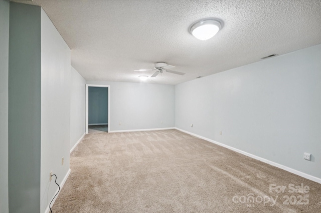 104 Britton Ave, Hendersonville, NC 28791 - unfurnished room with ceiling fan, carpet floors, and a textured ceiling