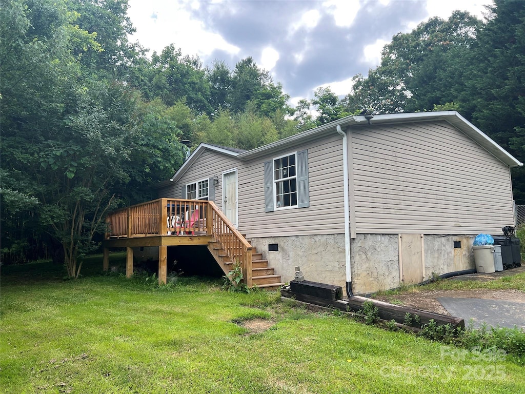20 Weathered Rd, Alexander, NC 28701 - back of house featuring a yard, a deck, stairway, and crawl space