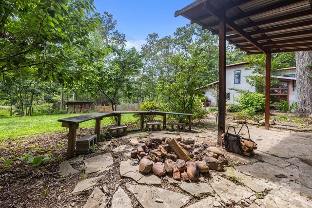 27 Rosebud Ln, Fairview, NC 28730 - view of patio / terrace featuring an outdoor fire pit