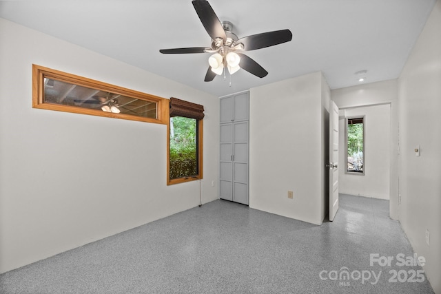 27 Rosebud Ln, Fairview, NC 28730 - unfurnished room with a ceiling fan