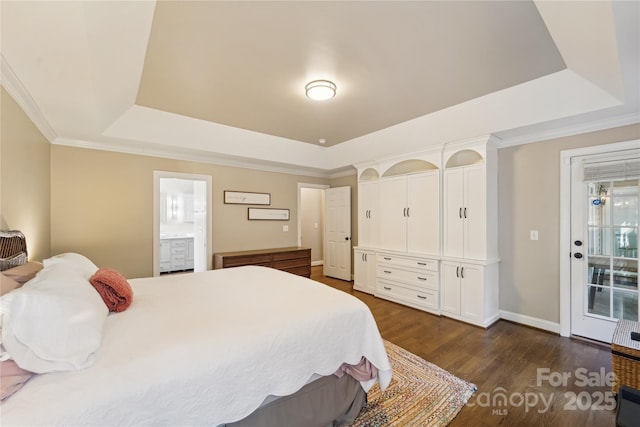 1237 Saint Johns Ave, Matthews, NC 28104 - bedroom featuring a tray ceiling, dark wood finished floors, and ensuite bathroom