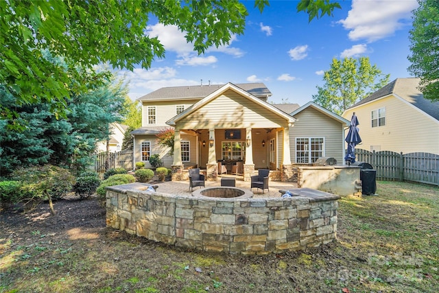 1237 Saint Johns Ave, Matthews, NC 28104 - rear view of property with an outdoor fire pit, a fenced backyard, and a patio