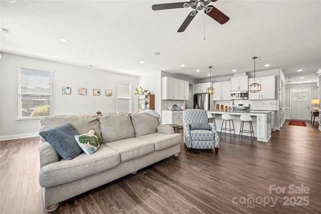 1009 Kemp Rd, Indian Trail, NC 28079 - living room with recessed lighting, dark wood finished floors, and a ceiling fan