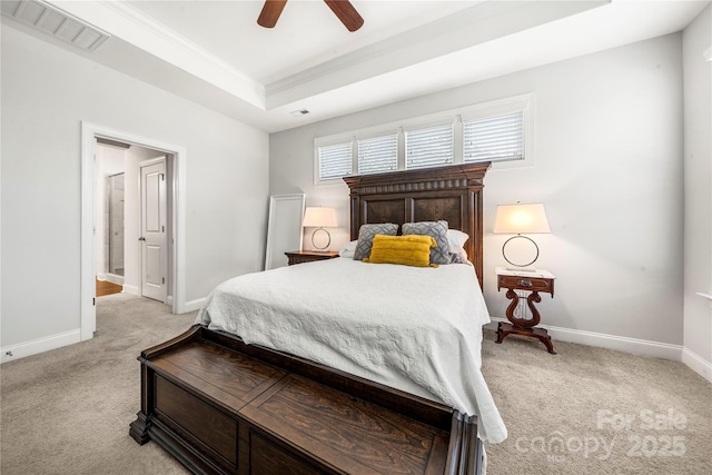 1009 Kemp Rd, Indian Trail, NC 28079 - bedroom with light carpet, crown molding, a tray ceiling, and a ceiling fan