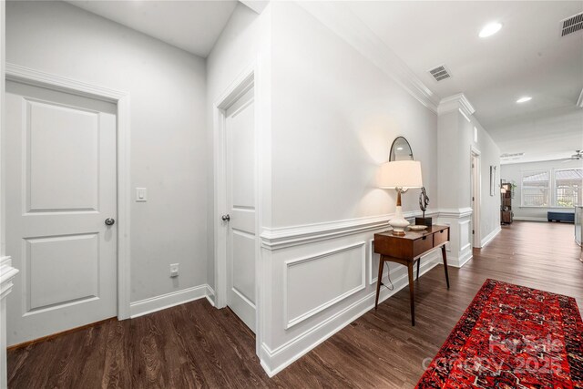 1009 Kemp Rd, Indian Trail, NC 28079 - corridor featuring dark wood-style flooring, recessed lighting, and ornamental molding