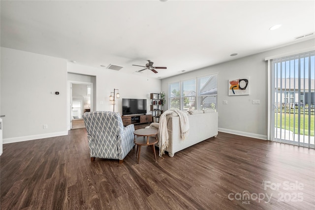 1009 Kemp Rd, Indian Trail, NC 28079 - living room featuring dark wood-style floors and a ceiling fan
