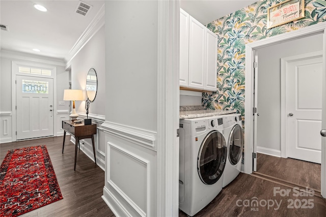 1009 Kemp Rd, Indian Trail, NC 28079 - laundry room featuring wallpapered walls, separate washer and dryer, ornamental molding, cabinet space, and a wainscoted wall