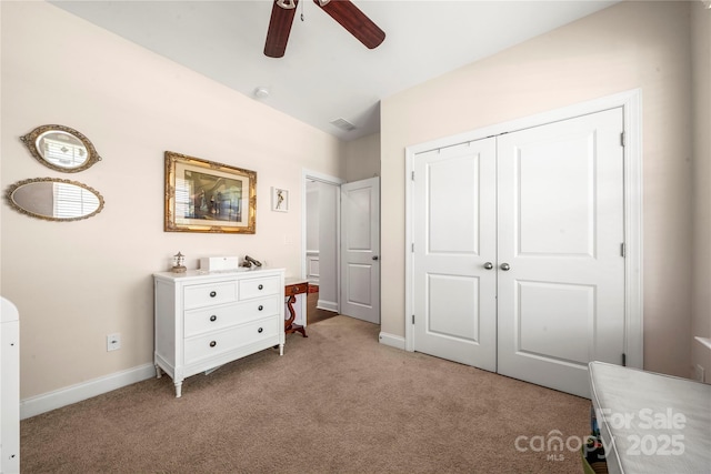1009 Kemp Rd, Indian Trail, NC 28079 - bedroom featuring light carpet, a closet, and a ceiling fan