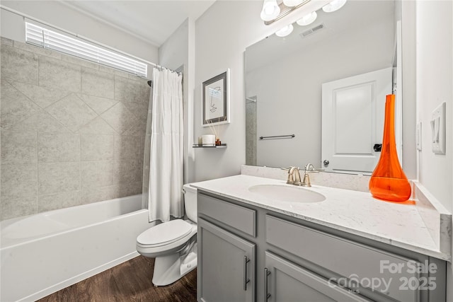 1009 Kemp Rd, Indian Trail, NC 28079 - full bath with wood finished floors, vanity, and shower / tub combo