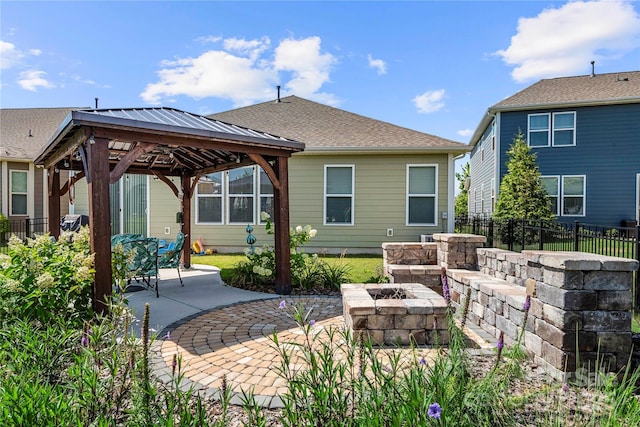 1009 Kemp Rd, Indian Trail, NC 28079 - view of patio / terrace featuring a fire pit and a gazebo