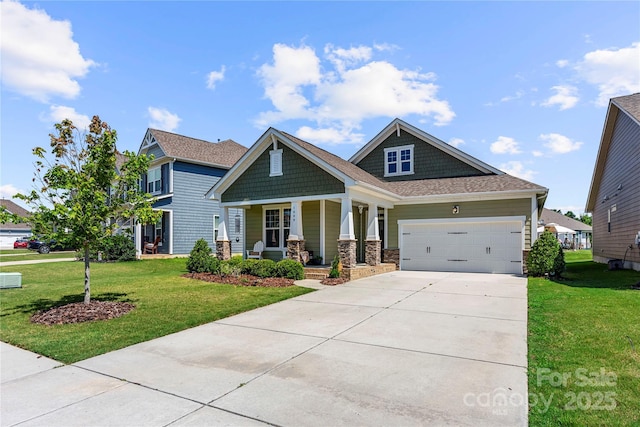 1009 Kemp Rd, Indian Trail, NC 28079 - craftsman house featuring a porch, a front lawn, a garage, and concrete driveway