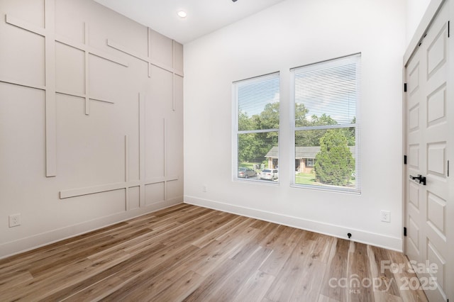 101 Bryan St, Kannapolis, NC 28083 - unfurnished bedroom with light wood finished floors and recessed lighting