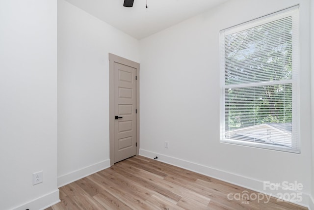 101 Bryan St, Kannapolis, NC 28083 - spare room featuring light wood finished floors, healthy amount of natural light, and a ceiling fan