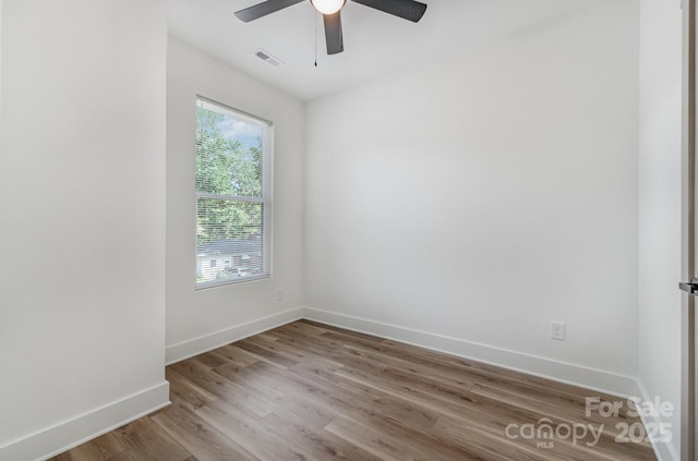 101 Bryan St, Kannapolis, NC 28083 - spare room featuring wood finished floors and ceiling fan