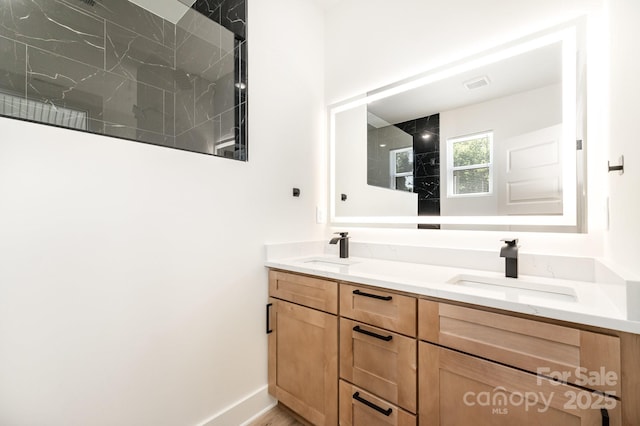 177 Georgia St SW, Concord, NC 28025 - bathroom with double vanity and a shower