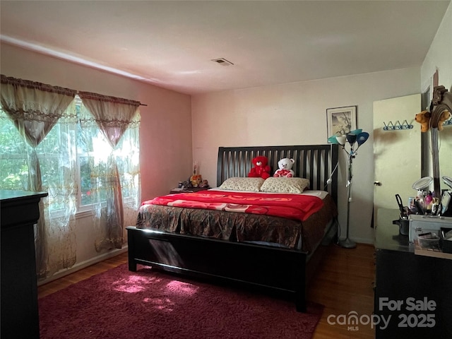 6708 Nutcracker Pl, Charlotte, NC 28212 - bedroom with wood finished floors