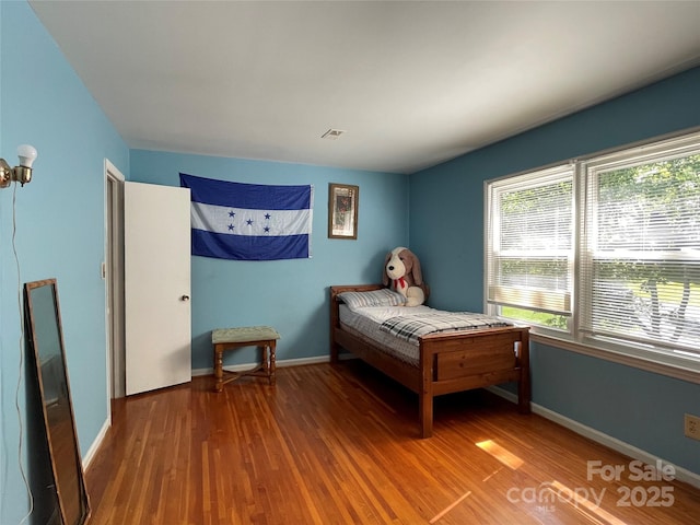 6708 Nutcracker Pl, Charlotte, NC 28212 - bedroom with wood finished floors