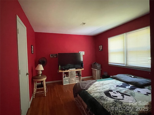6708 Nutcracker Pl, Charlotte, NC 28212 - bedroom featuring wood finished floors and baseboards