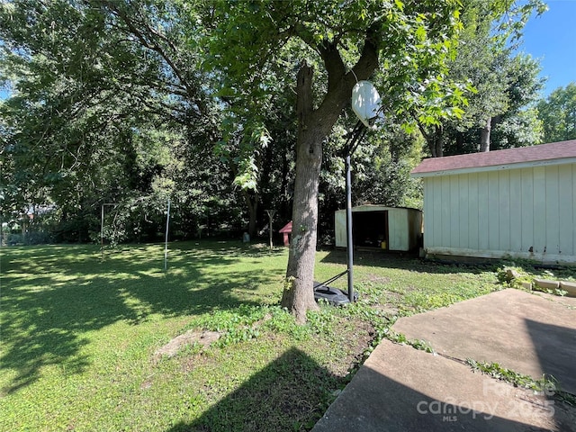 6708 Nutcracker Pl, Charlotte, NC 28212 - view of grassy yard featuring a storage unit