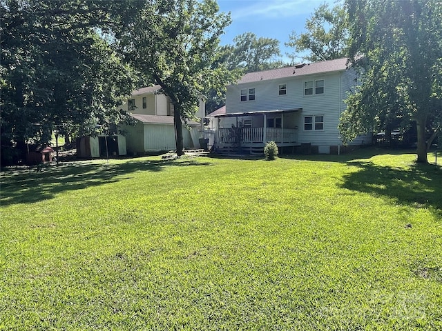 6708 Nutcracker Pl, Charlotte, NC 28212 - view of green lawn with a wooden deck